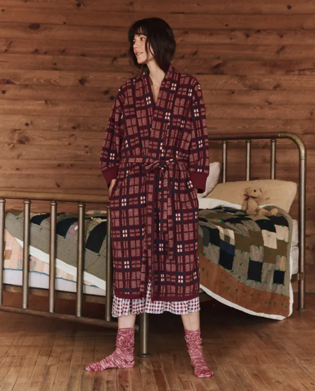 The Plush Fleece Robe. -- Fireside Plaid sold by THE GREAT.