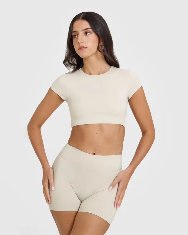 SoftMotion™ Short Sleeve Crop Top | Sand sold by Oner Active