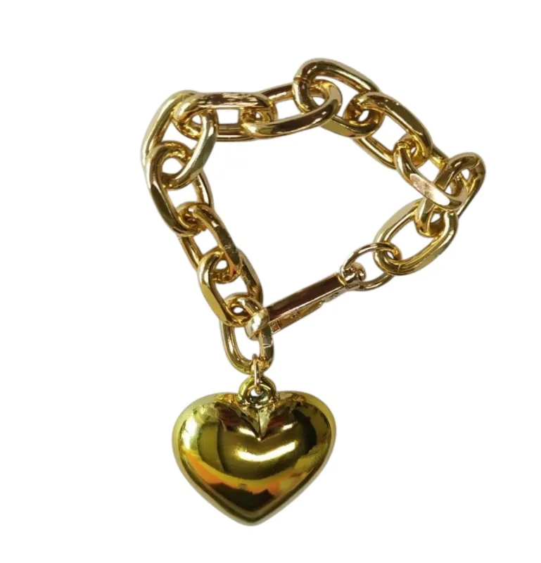 Romy Bag Charm Gold sold by HAUTE SHORE