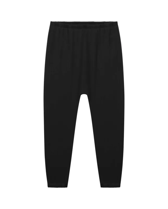 The Jersey Jogger Pant. -- Washed Black sold by THE GREAT.