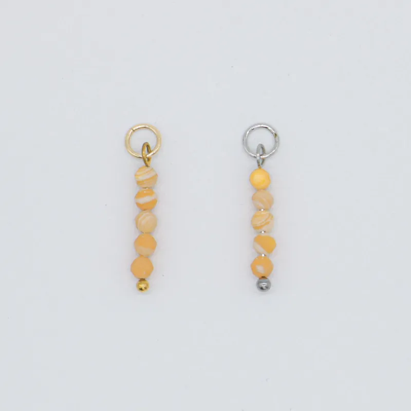 Coral Shell Bead Charm sold by Regina jewelry