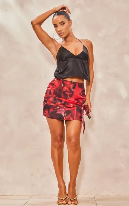 Red Floral Print Textured Chiffon Knot Front Mini Skirt sold by Pretty Little Thing