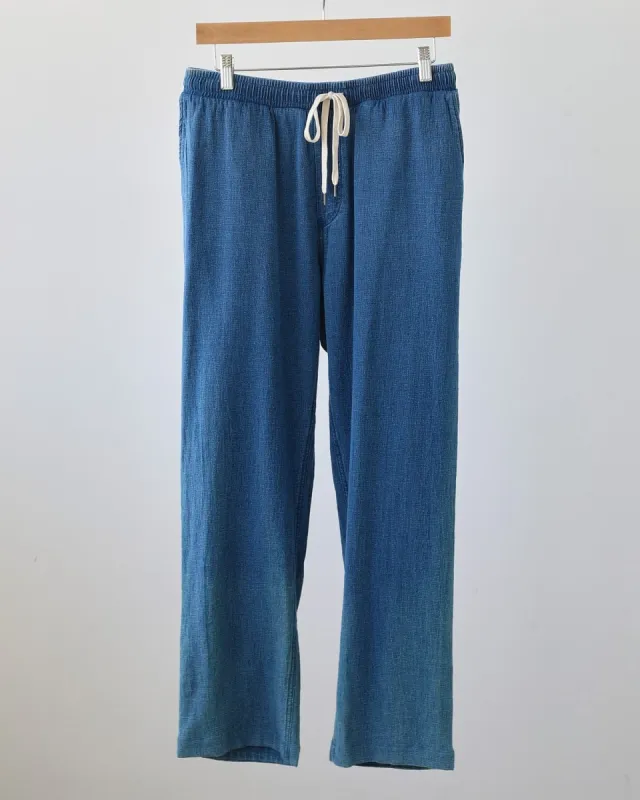 Washed Indigo Drawstring Trousers sold by Corridor