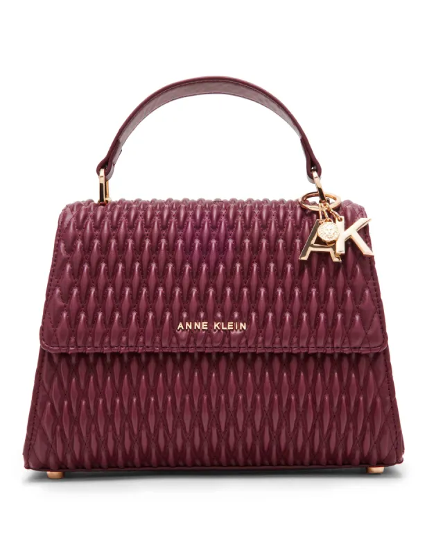 Medium ruched flap top handle with convertible strap sold by Anne Klein