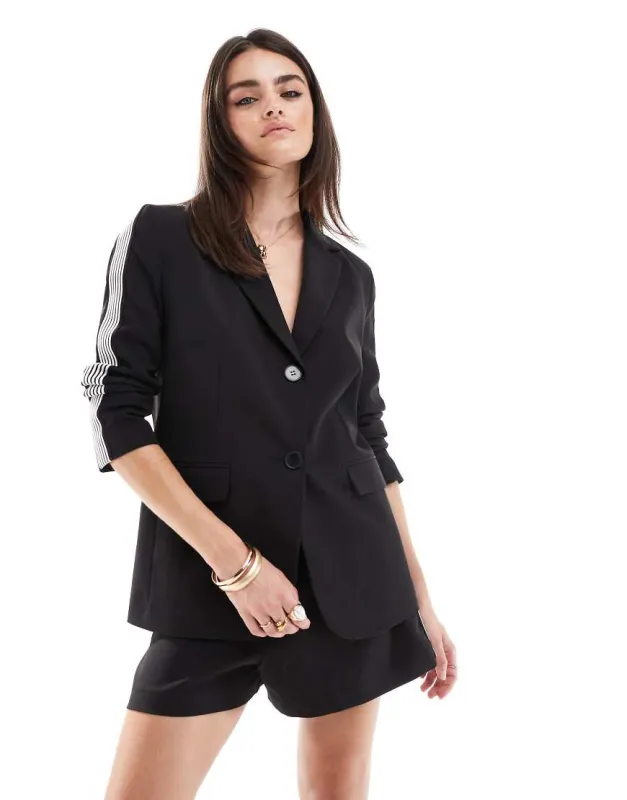 Miss Selfridge sporty side stripe relaxed fit blazer in black sold by ASOS