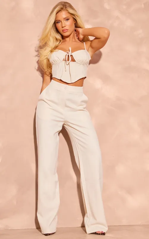 Cream Woven Tailored Mid Rise Wide Leg Trousers sold by Pretty Little Thing