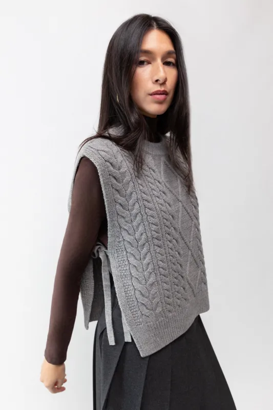 SLEEVELESS CABLE-KNIT VEST WITH TIES sold by OAK AND FORT