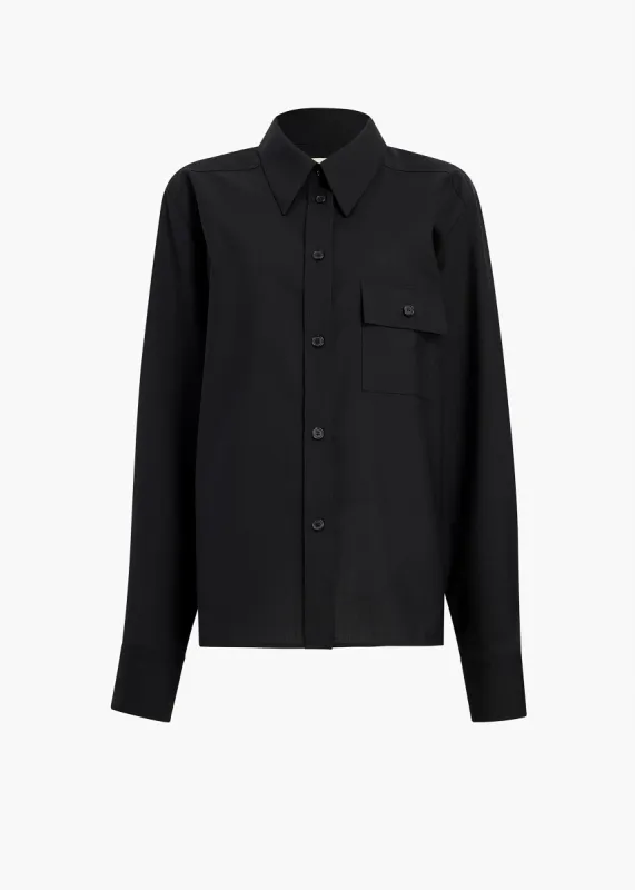 Yatty Top in Black sold by KHAITE