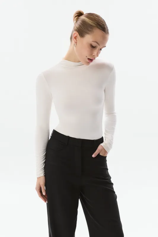 Saint Body Mini Turtleneck Bodysuit White sold by Ivalo.com