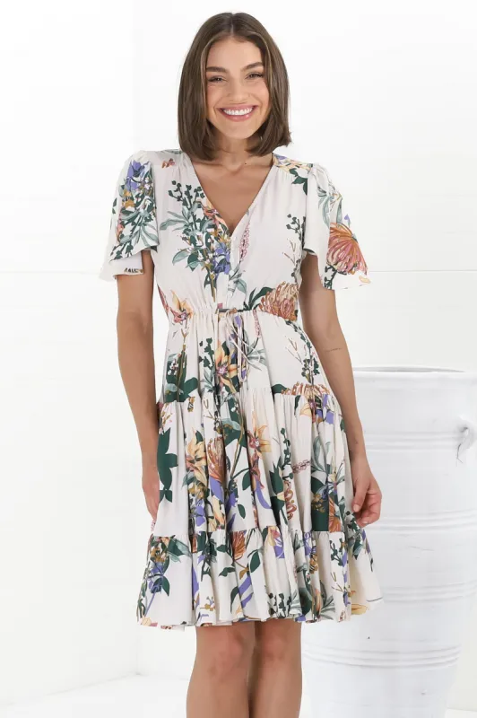 Elle Mini Dress - Buttoned Bodice A-Line Dress with Flute Sleeves in Raven Print White sold by Salty Crush