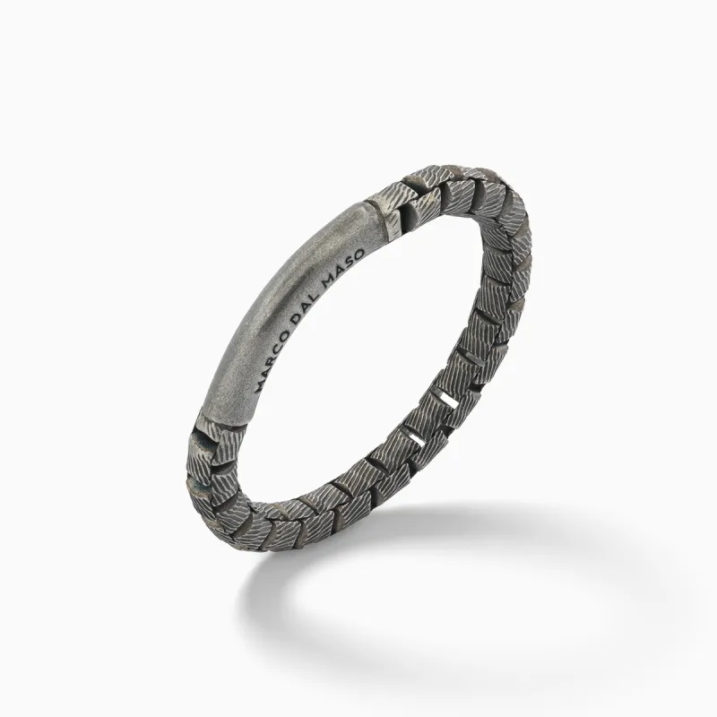 ULYSSES Carved Tubular Ring sold by Marco Dal Maso