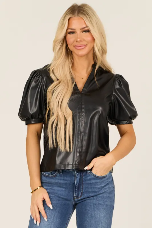 Black Puff Sleeve Split Neck Faux Leather Top sold by Lime Lush