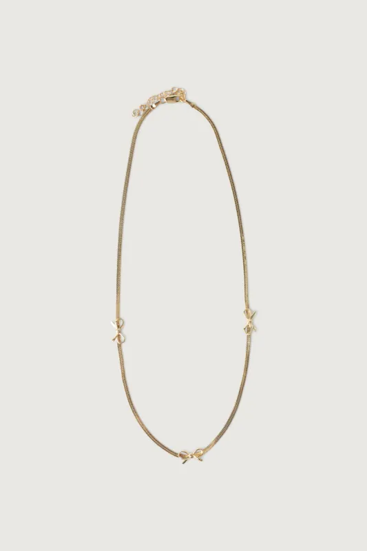 SNAKE CHAIN NECKLACE WITH BOWS sold by OAK AND FORT