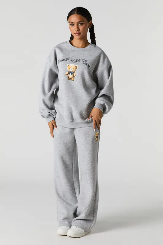 Graphic Fleece Wide Leg Sweatpant sold by Urban Planet