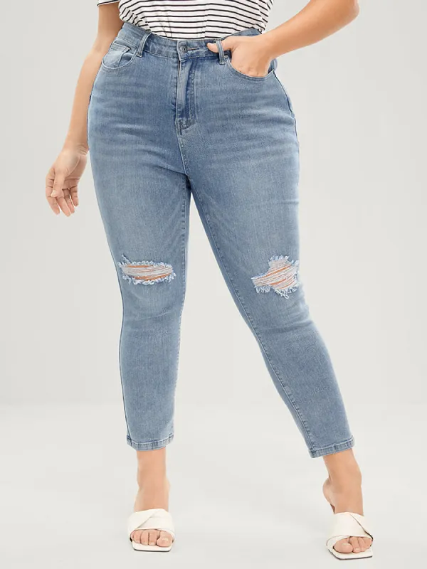 Skinny Very Stretchy Mid Rise Light Wash Distressed  Jeans sold by Bloomchic
