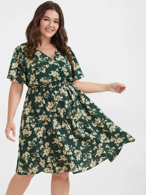 Floral Belted Button Ruffled Wrap Knee Dress sold by Bloomchic