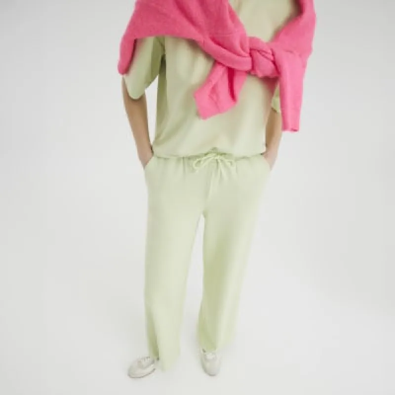 Lime High Waisted Wide Leg Joggers sold by River Island