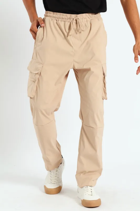 Multi Pocket Technical Cargo Pants - Stone sold by Edgars