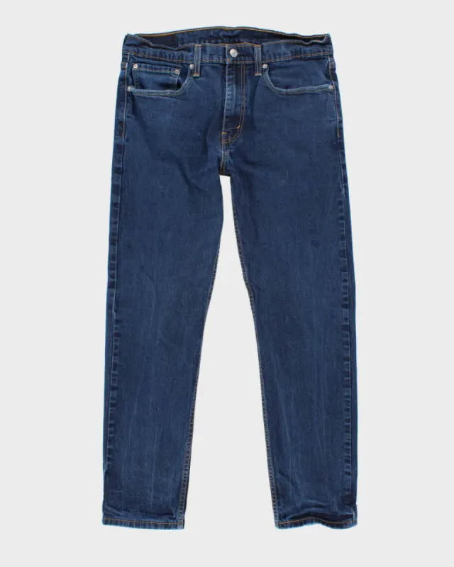 Vintage 90's Levi's 502 Regular Fit Dark Wash Jeans - W32 L28 sold by Rokit