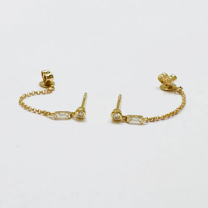 double bezel set diamond studs with chain sold by Theodosia
