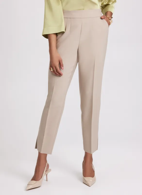 Pleated Slim-Leg Pants sold by Laura
