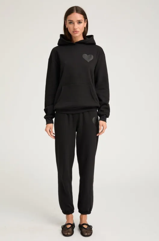 Black Glossy Heart Sweatpants sold by SPRWMN