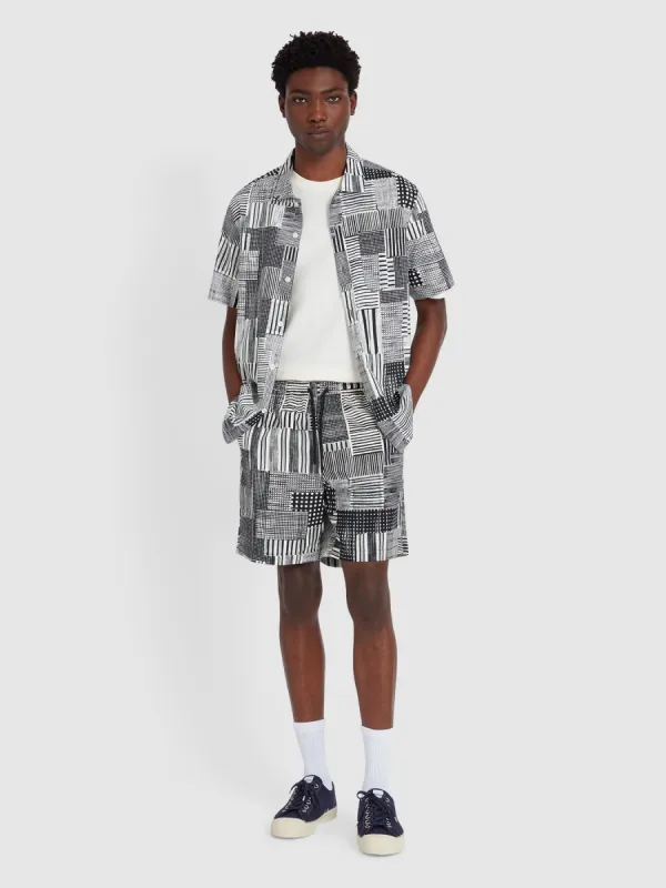 Redwald Archive Print Shorts In Black sold by Farah