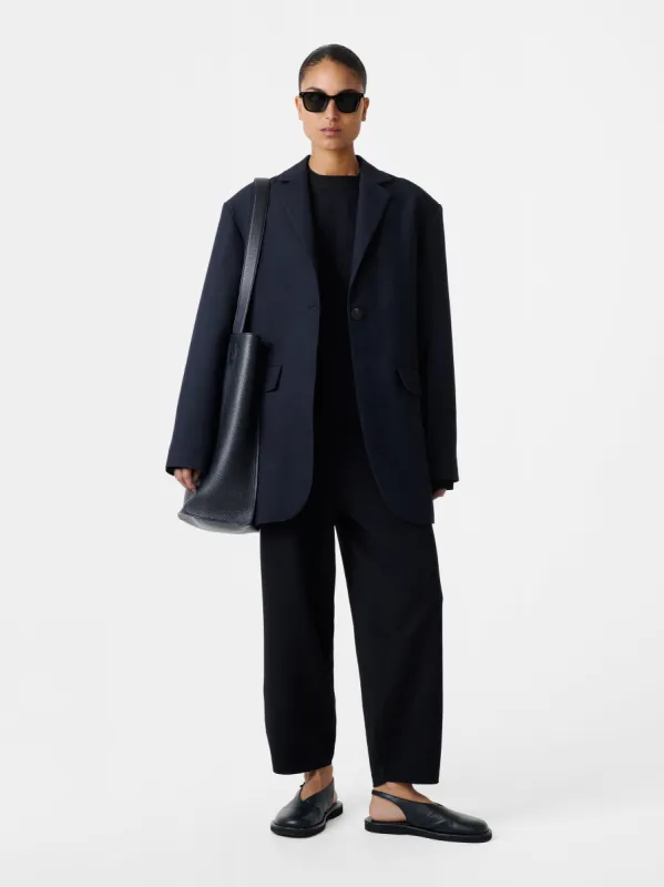 Moura Pant in Darkest Navy sold by Studio Nicholson