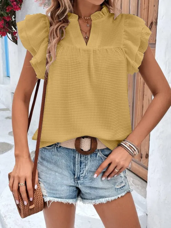 Ruffle sleeve blouse sold by Charming Charlie