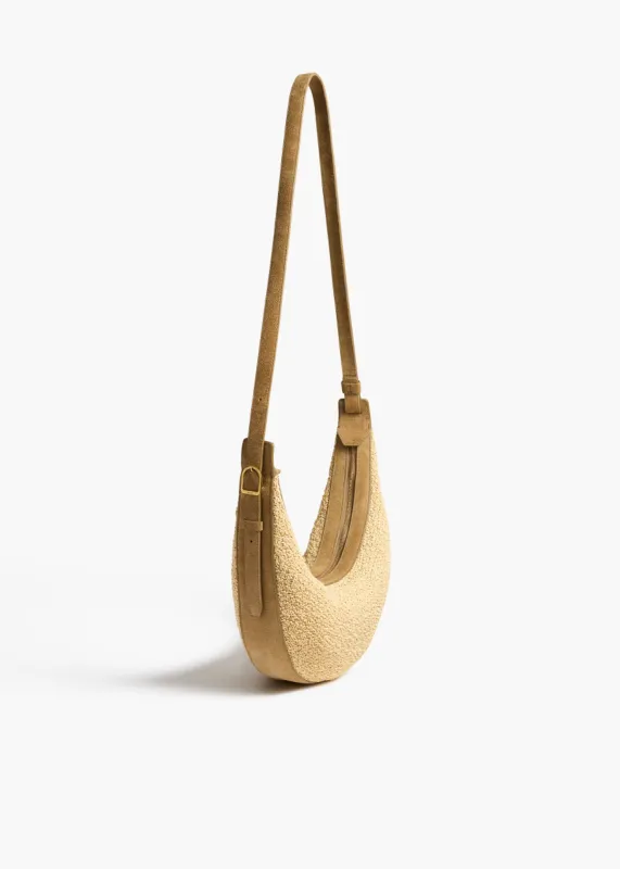 Small Augustina Crossbody Bag in Wheat Suede and Natural Raffia sold by KHAITE