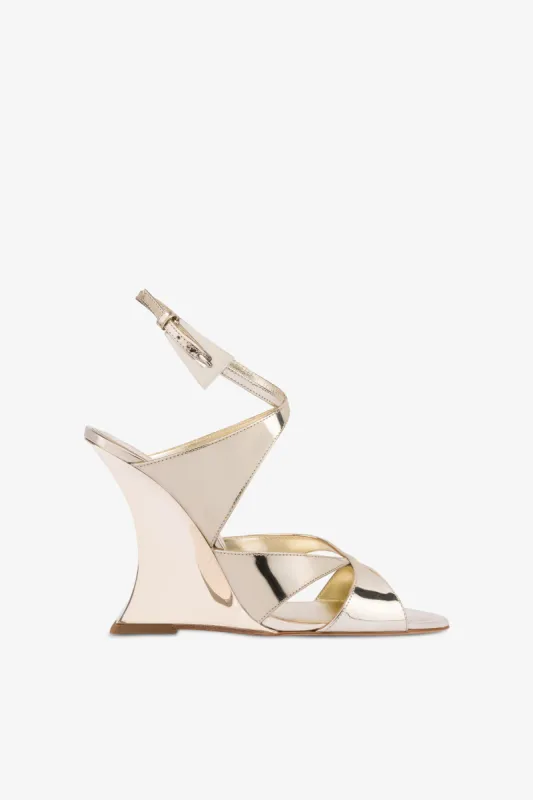 Sandals in platinum mirror-effect leather sold by Paris Texas