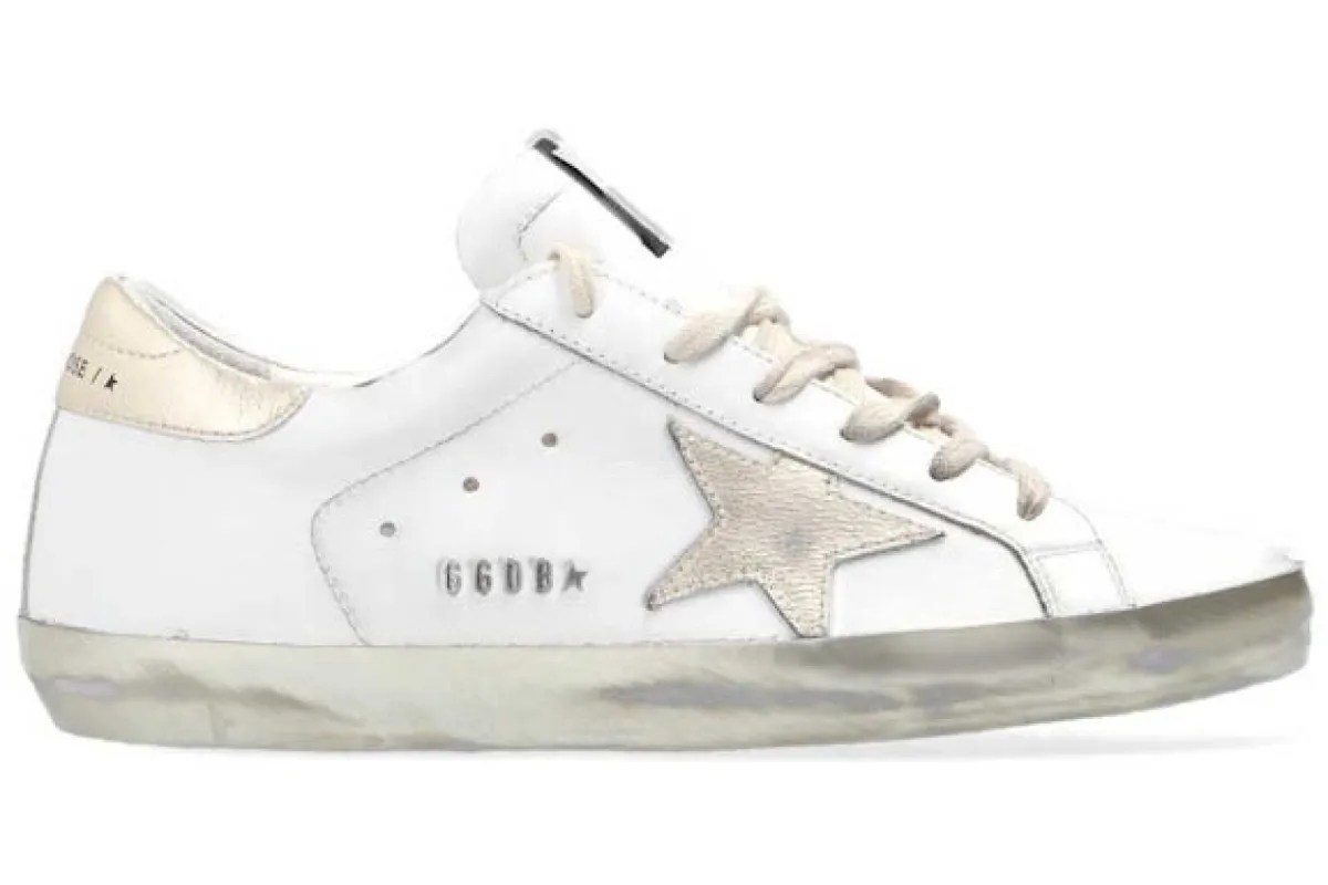 Golden Goose Super-Star White Gold Sparkle (Women's) sold by Addict Sneakers