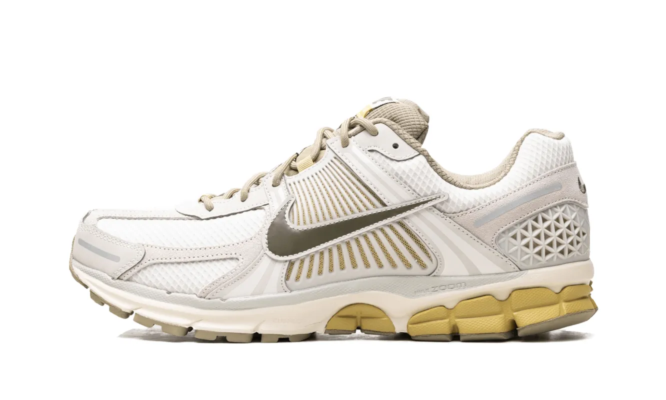 Nike Zoom Vomero 5 Light Bone Medium Olive sold by Addict Sneakers