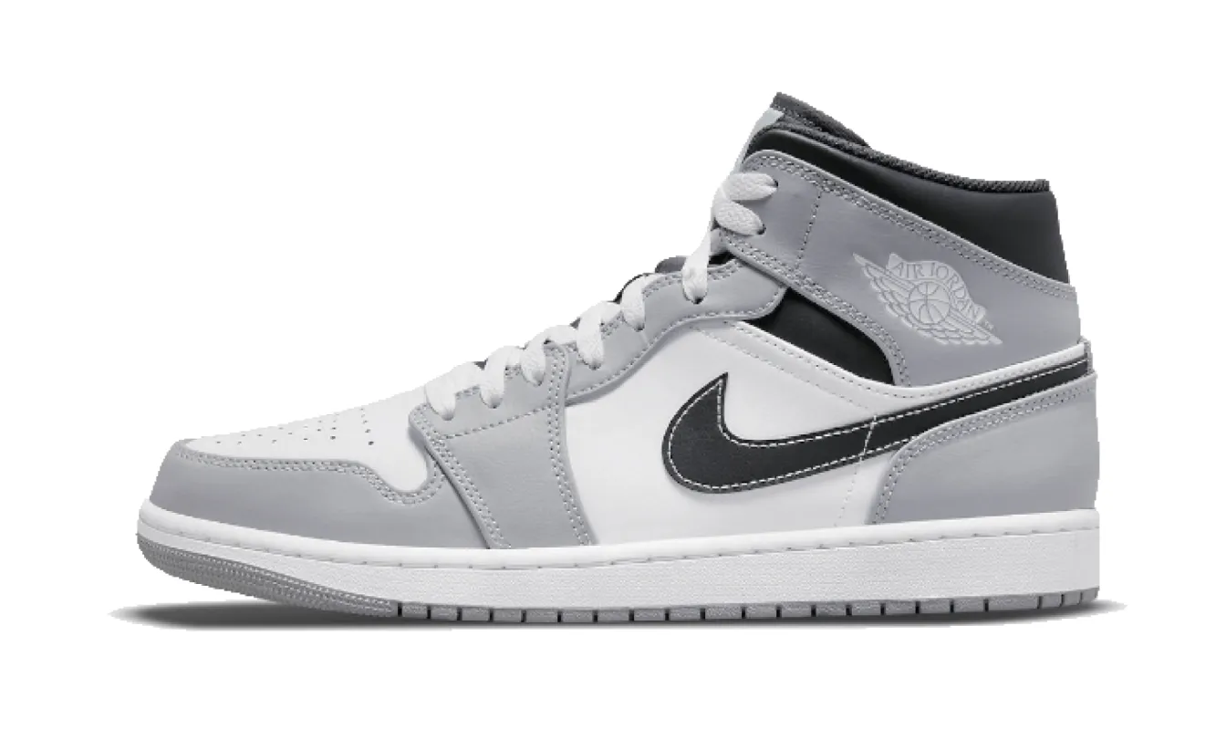 Air Jordan 1 Mid Light Smoke Grey Anthracite sold by Addict Sneakers