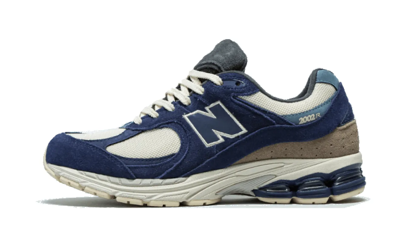New Balance 2002R Navy Cream sold by Addict Sneakers