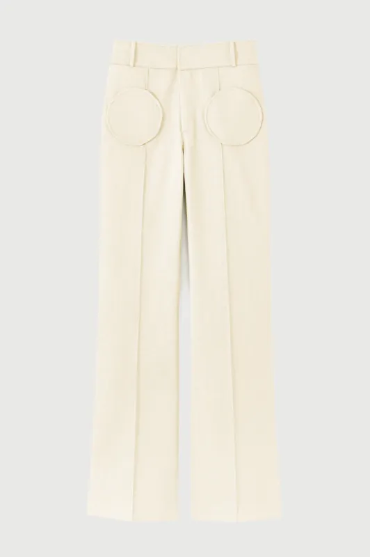 Denim ecru flared pants with circular pocket details sold by DESTREE