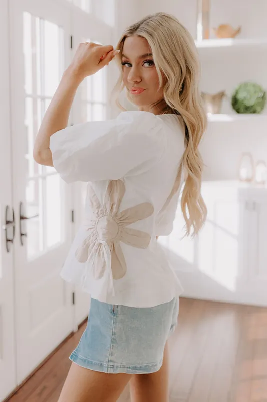 Make A Statement Floral Peplum Top In White sold by Impressions