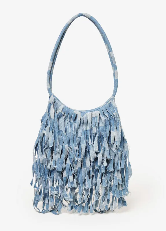 Fringed Patchwork Denim Bag sold by Ashley Stewart