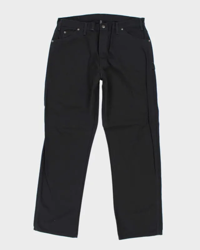 Vintage 2000's Dickies Heavyweight Faded Wide Leg Carpenter Trousers - W36 L33 sold by Rokit