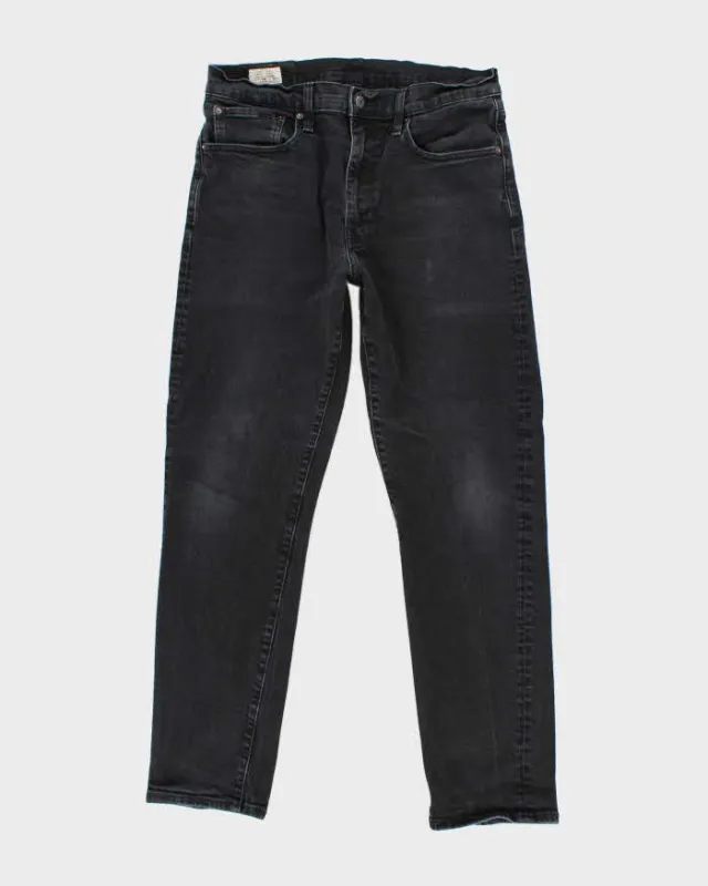 Vintage Levi's 502 Black Dark Wash Tapered Jeans - W30 L28 sold by Rokit