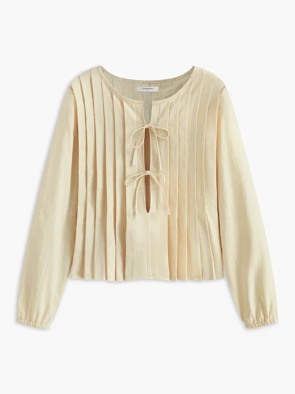 Pleated Tie-Neck Top sold by COMMENSE