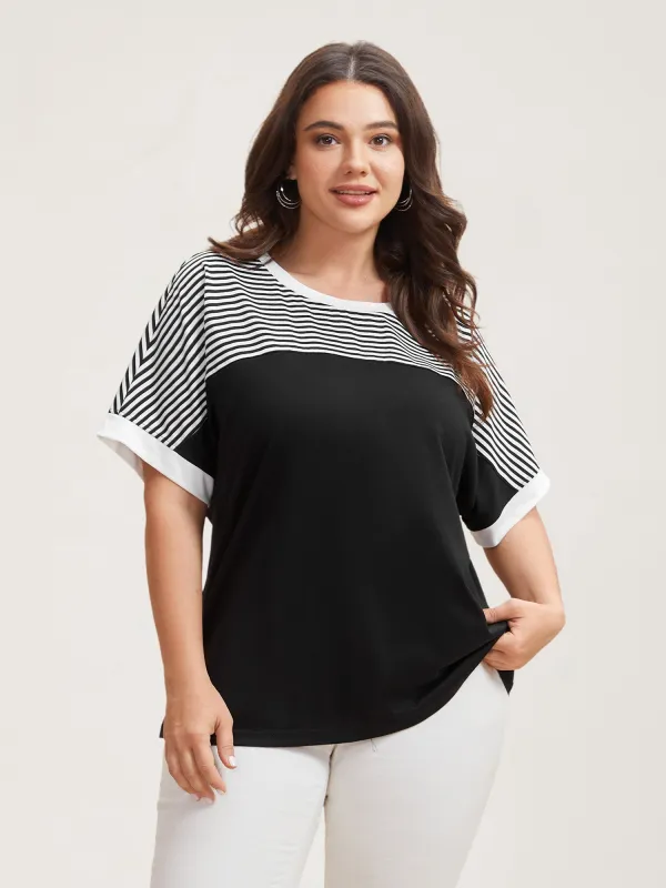 Solid and Striped Contrast Hem T-Shirt sold by Bloomchic