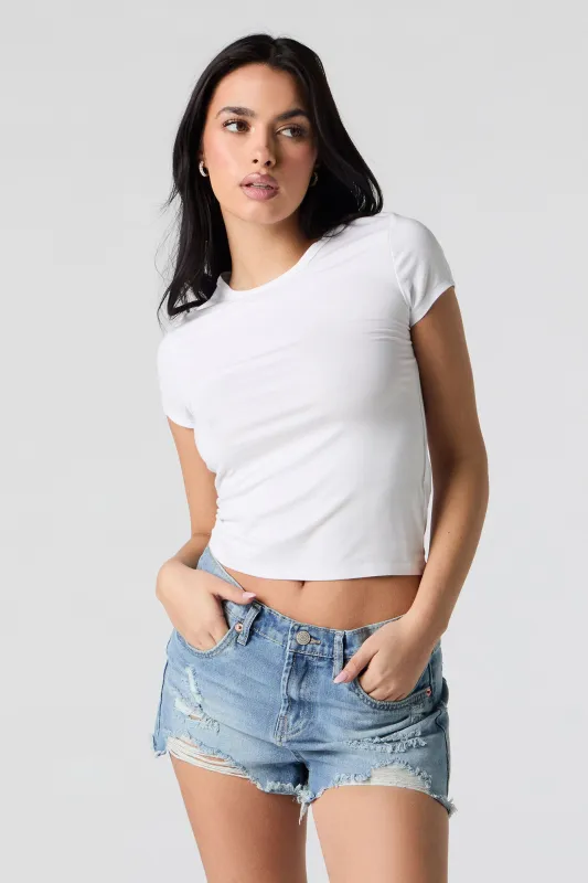 Medium Wash Distressed Rigid Short sold by Charlotte Russe