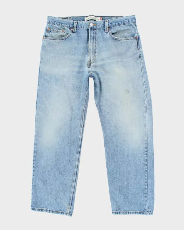 Vintage Levi's Regular Relaxed Fit Medium Wash Jeans - W36 L28 sold by Rokit