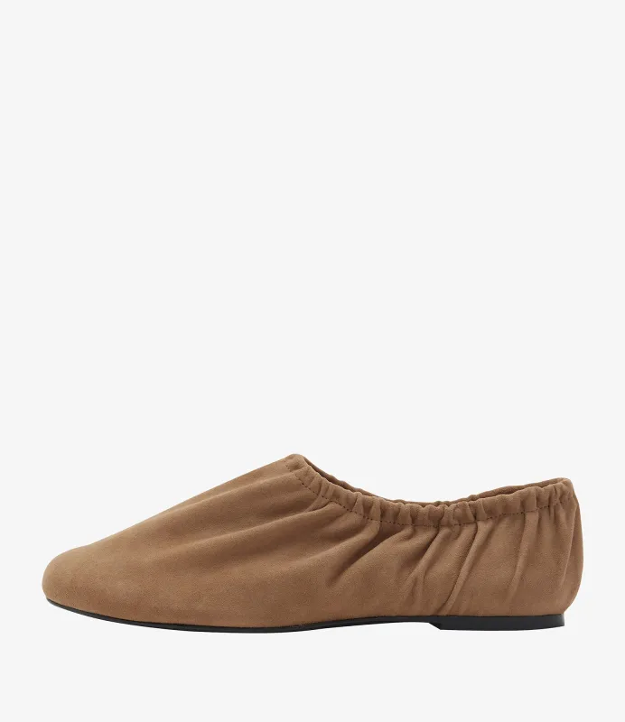 Swan slip-ons sold by A.P.C.
