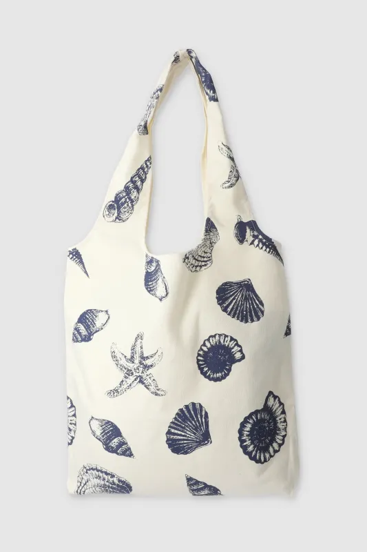 Bolsa tela con conchas sold by Shasa