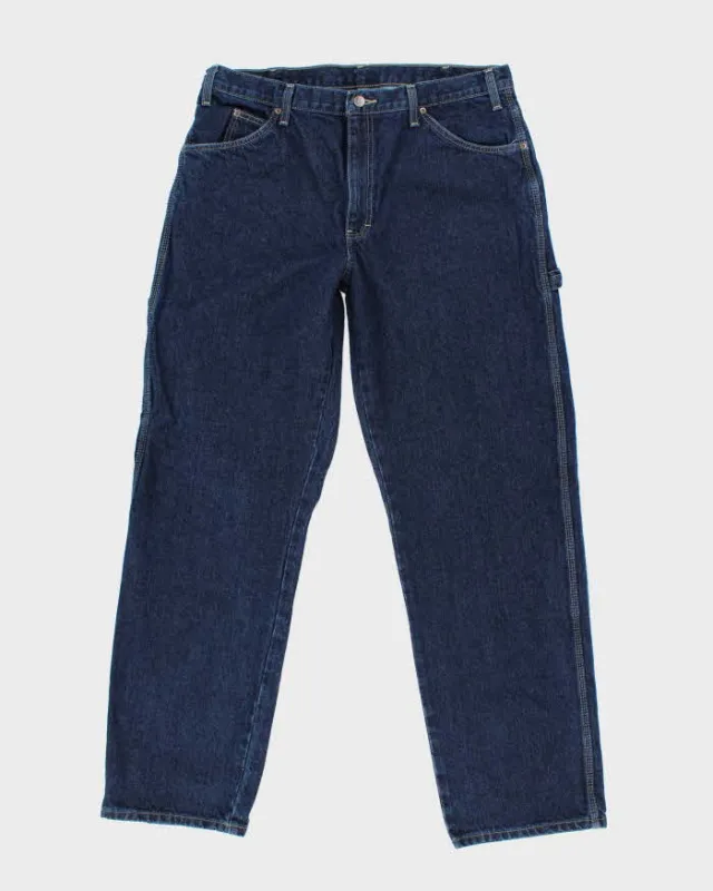 Vintage 2000's Dickies Heavyweight Dark Denim Carpenter Trousers - W34 L33 sold by Rokit