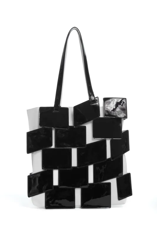 Laquered Patchwork Tote Bag in Black Lacquered Leather sold by Gabriela Hearst
