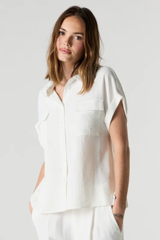 Flowy Short Sleeve Button-Up Top sold by Urban Planet
