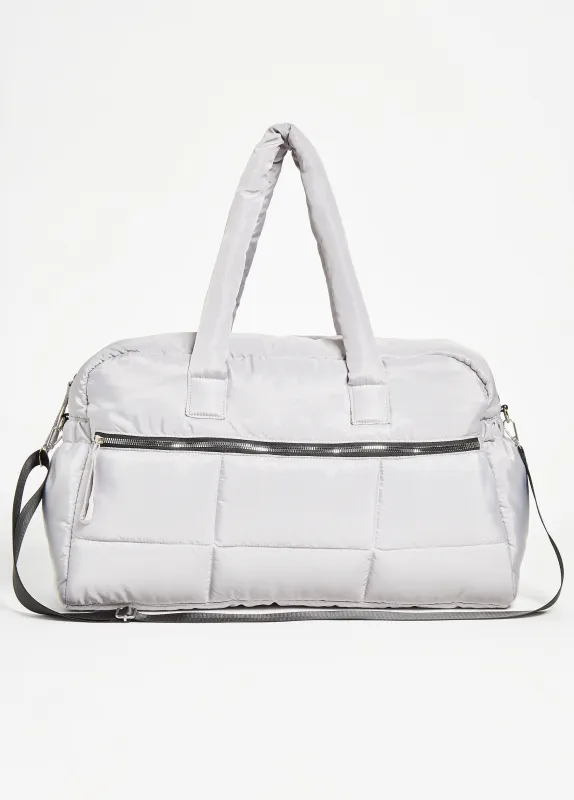 Quilted Puffer Duffle Bag sold by Ashley Stewart